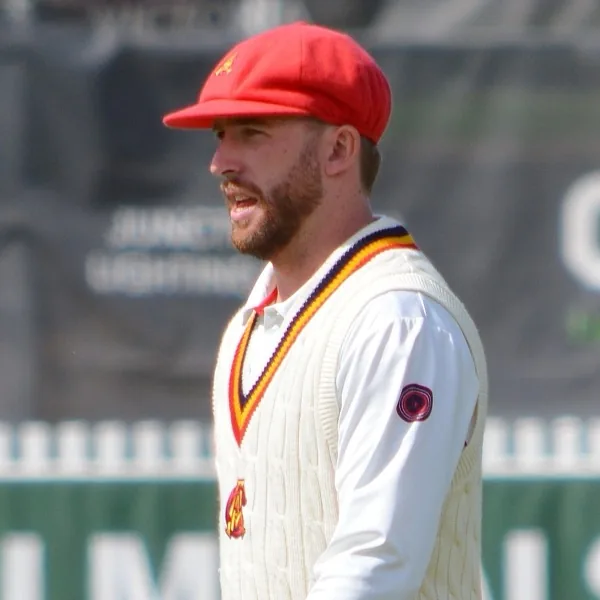 Mackenzie Harvey portrait in South Australia Sheffield Shield match shirt and sweater