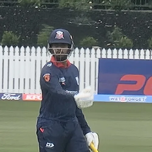 Adithya Ashok portrait in Auckland Aces 2025 match shirt
