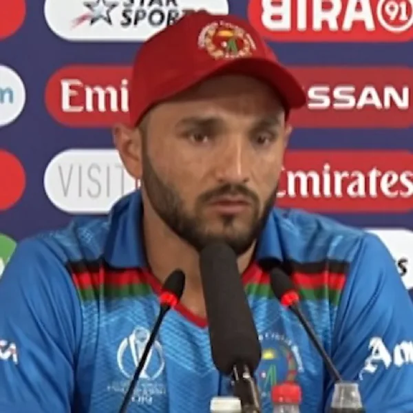Gulbadin Naib portrait in Afghanistan national team press-conference shirt