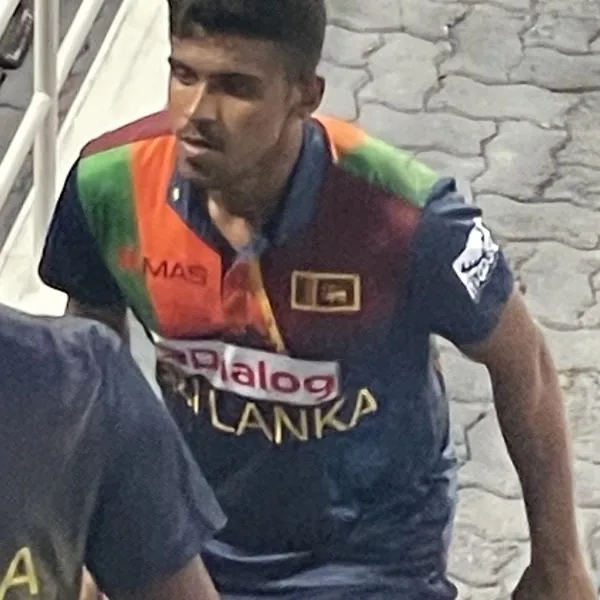 Maheesh Theekshana portrait in Sri Lanka national team 2022 playing shirt