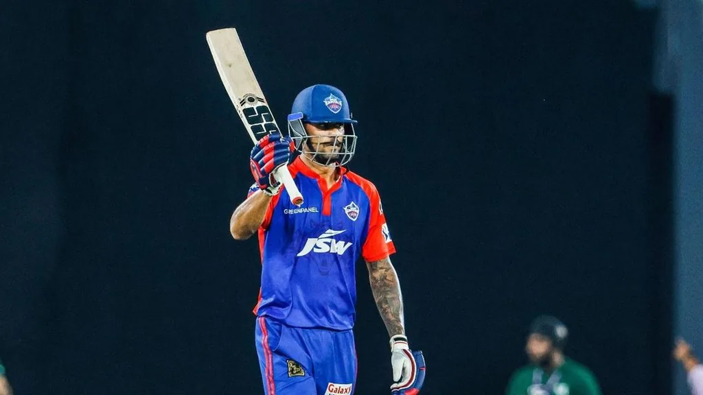 Aman Khan portrait in Official Delhi Capitals playing shirt