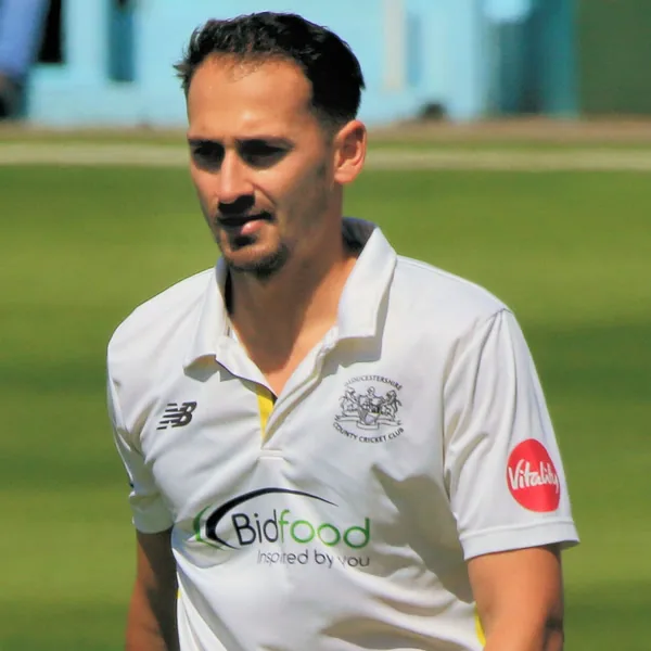 Zaman Akhter portrait in Gloucestershire County Championship playing shirt