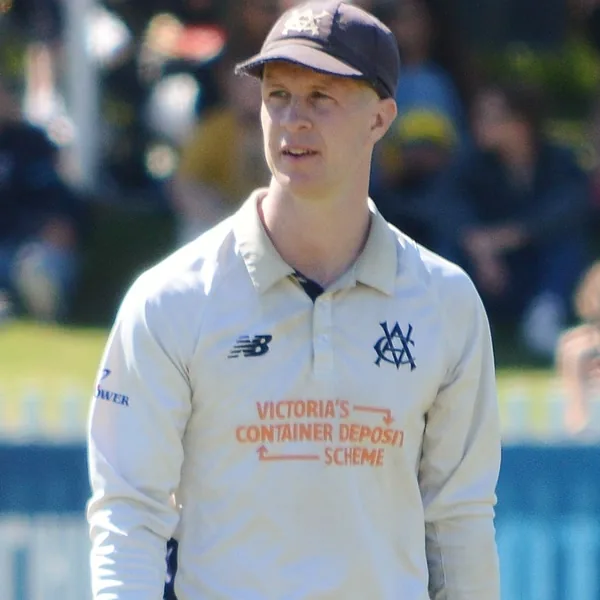 Sam Harper portrait in Victoria Sheffield Shield wicketkeeping shirt and cap