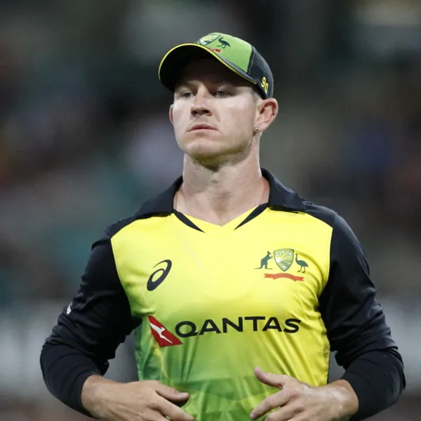 D'Arcy Short portrait in Australia T20 playing shirt and cap