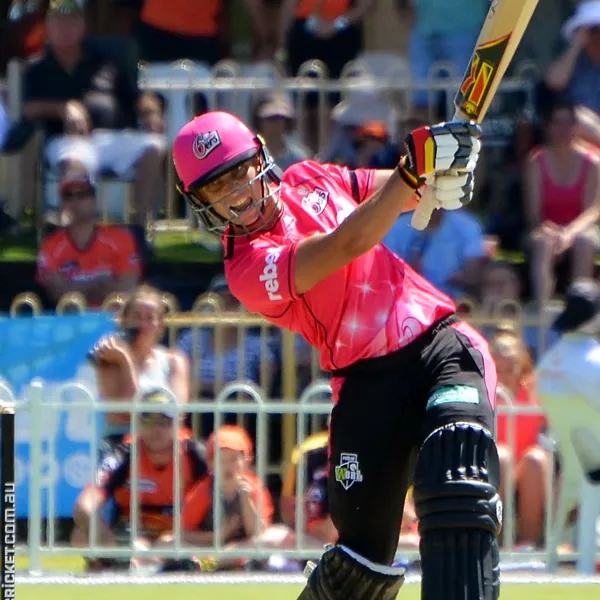 Ashleigh Gardner portrait in Sydney Sixers WBBL playing shirt and helmet
