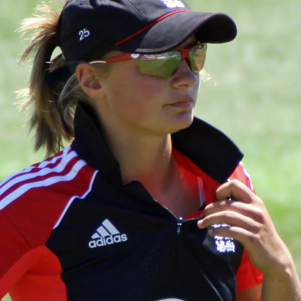 Danni Wyatt-Hodge portrait in England T20 playing shirt and cap