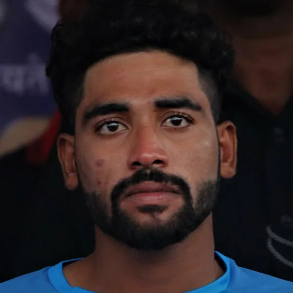 Mohammed Siraj portrait in India cricket training shirt