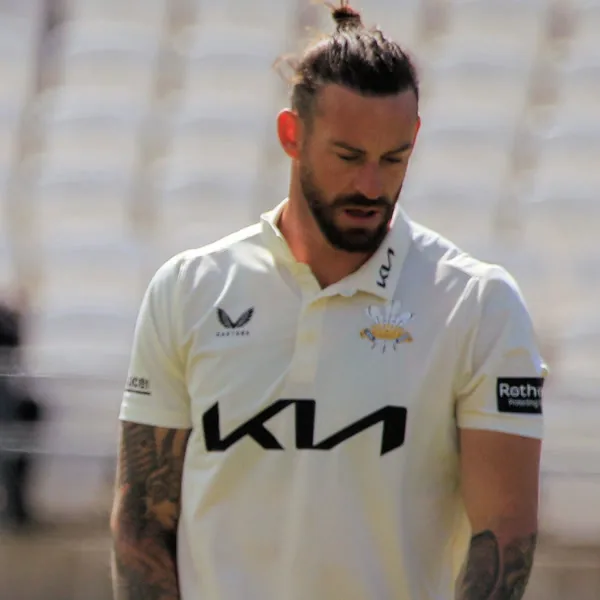 Jordan Clark portrait in Surrey County Championship playing shirt