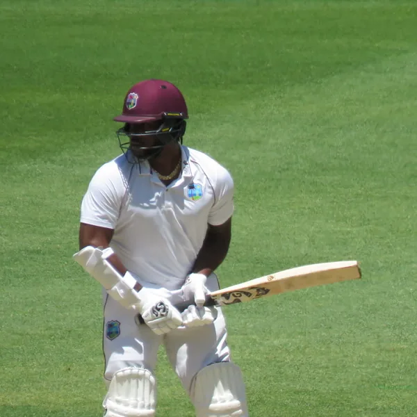 Kyle Mayers portrait in West Indies Test playing shirt and helmet