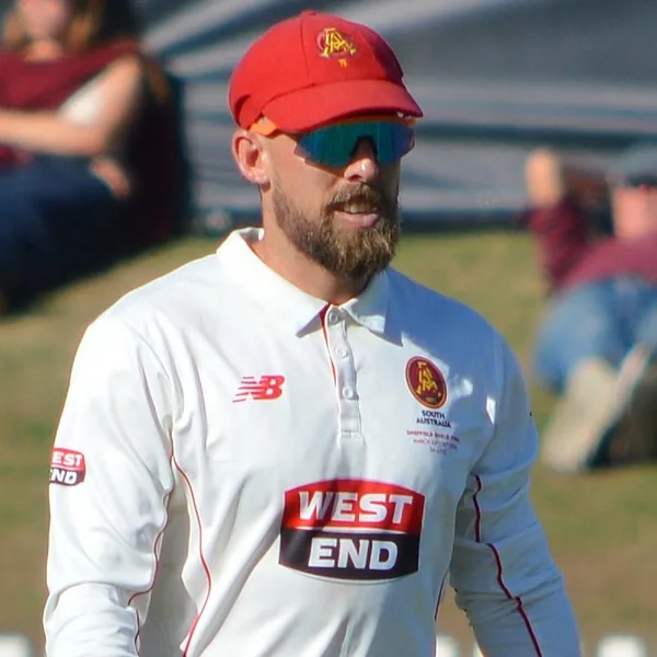 Jake Lehmann portrait in South Australia Sheffield Shield playing shirt and cap