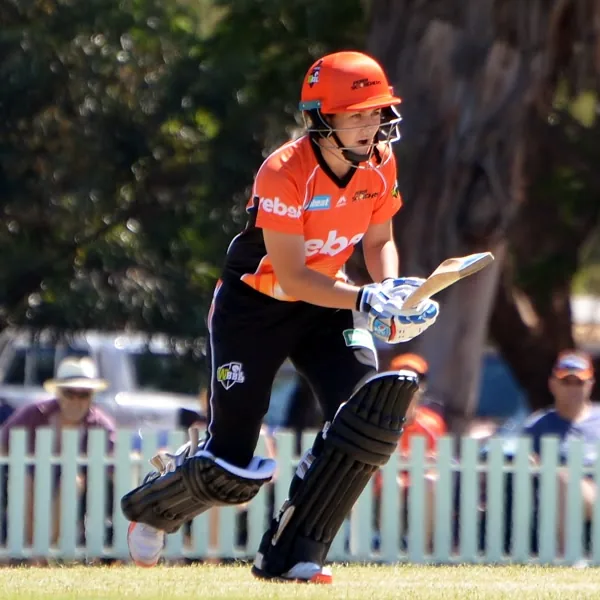 Heather Graham portrait in Perth Scorchers WBBL playing shirt and helmet