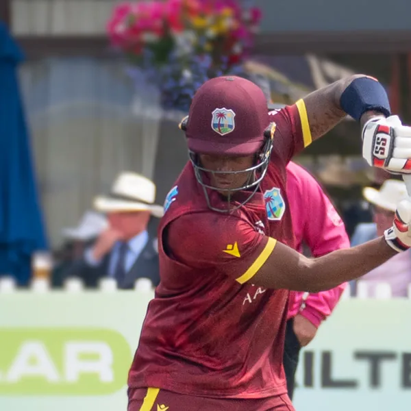 Keacy Carty portrait in West Indies national team playing shirt and helmet