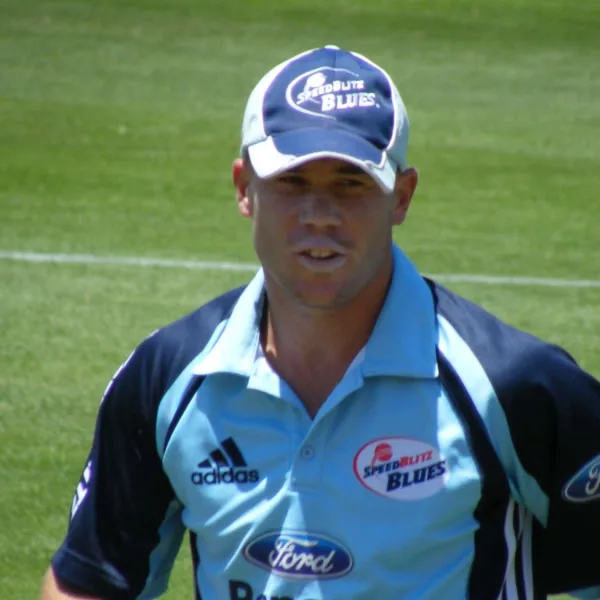 David Warner portrait in New South Wales domestic playing shirt and cap
