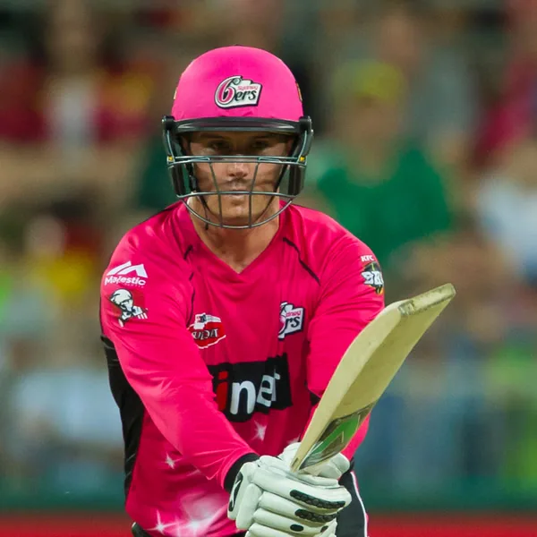 Jason Roy portrait in Sydney Sixers playing shirt and helmet