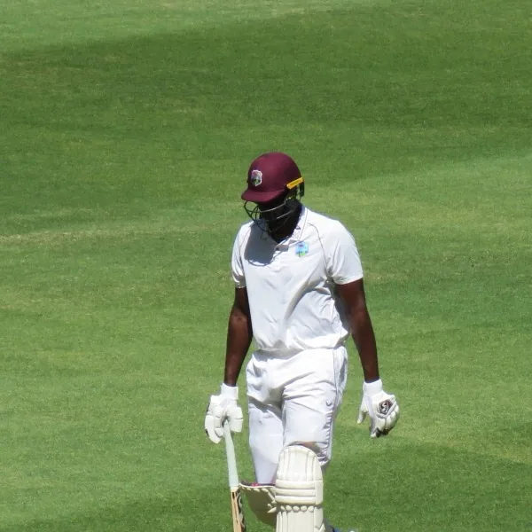 Jason Holder portrait in West Indies Test batting shirt and helmet