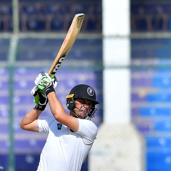 Israrullah portrait in Professional domestic cricket playing shirt