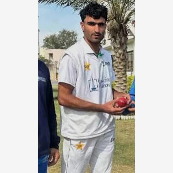 Khan Zeb portrait in Professional first-class cricket playing shirt