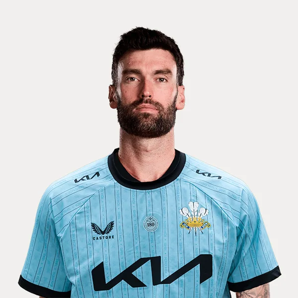 Reece Topley portrait in Official Surrey squad shirt