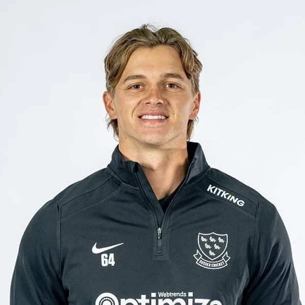 George Thomas portrait in Official Sussex player-directory shirt or playing portrait