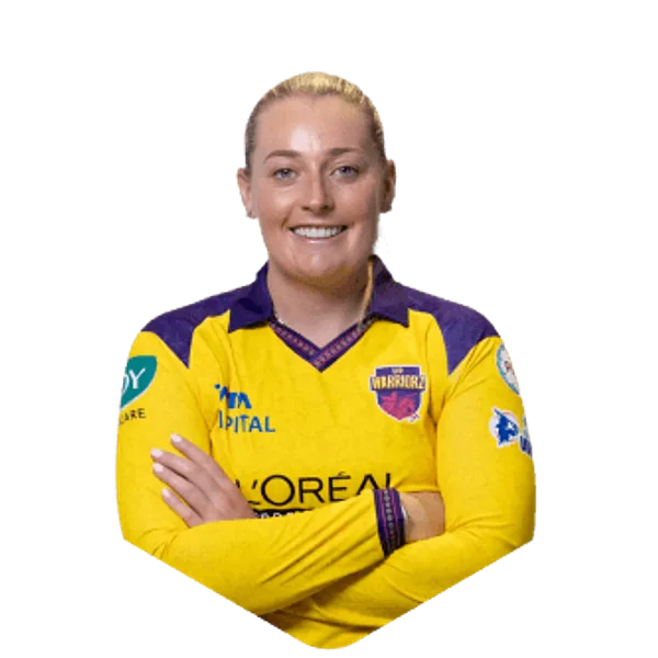 Sophie Ecclestone portrait in Official UP Warriorz 2026 squad shirt
